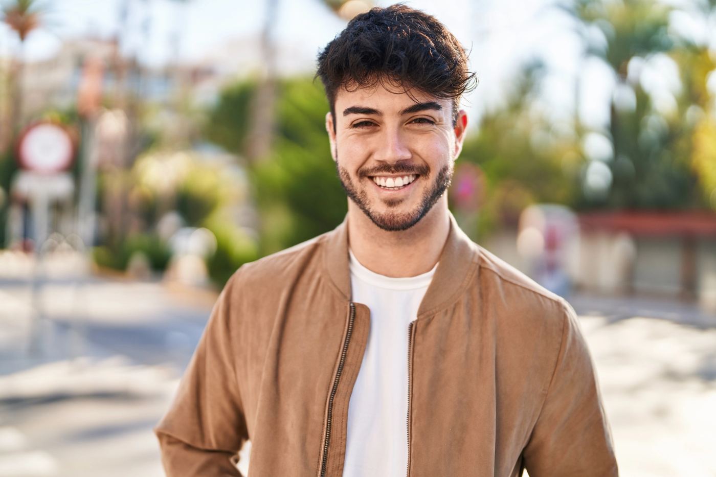 A patient smiling after restorative care